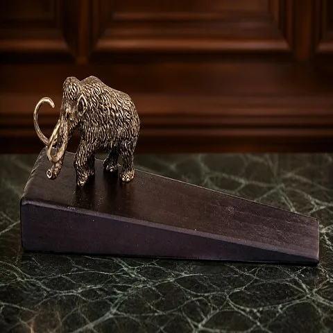 На память: Подставка под дверь «Мамонт»